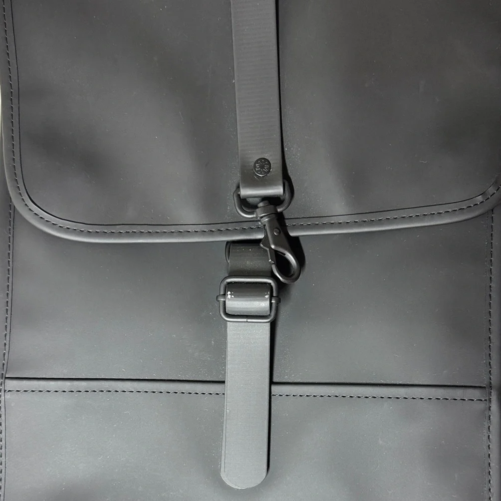Rains waterproof  black backpack.